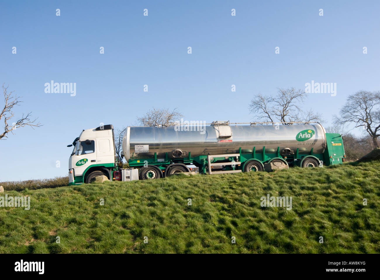 milk tanker travelling through the english countryside Stock Photo