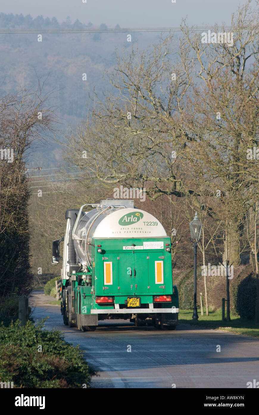 milk tanker travelling through the english countryside Stock Photo