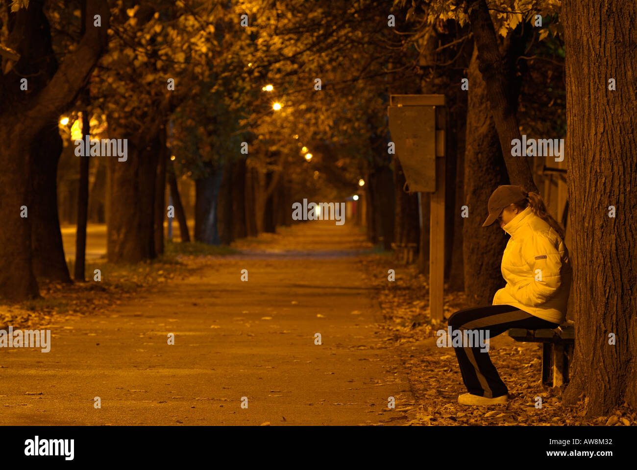 Woman alone night time street hi-res stock photography and images - Alamy