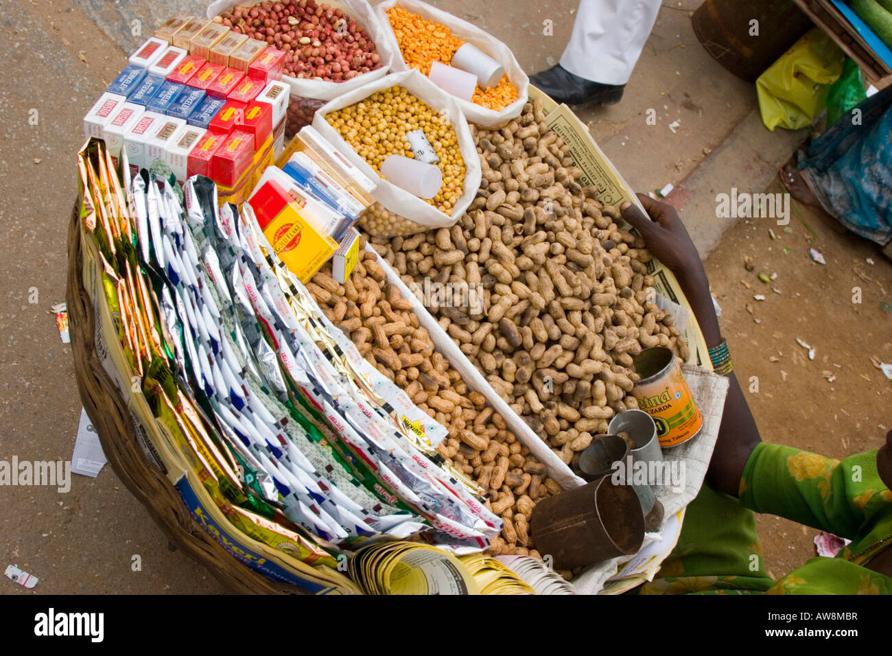 Selling peanuts and cigarettes on the street in Bangalore India Stock