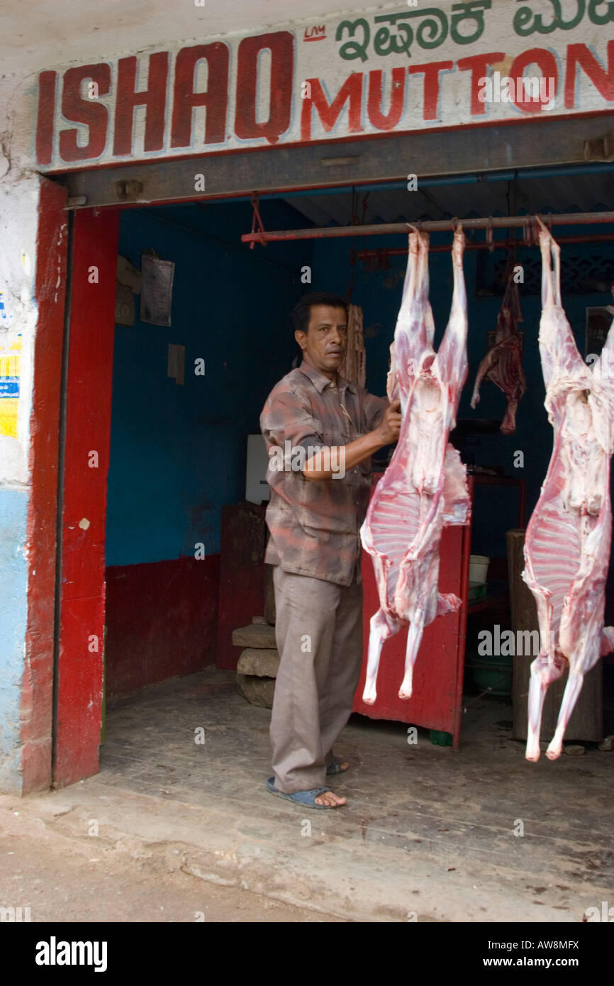 Carcasses of sheep hanging for sale outside a mutton shop in Bangalore