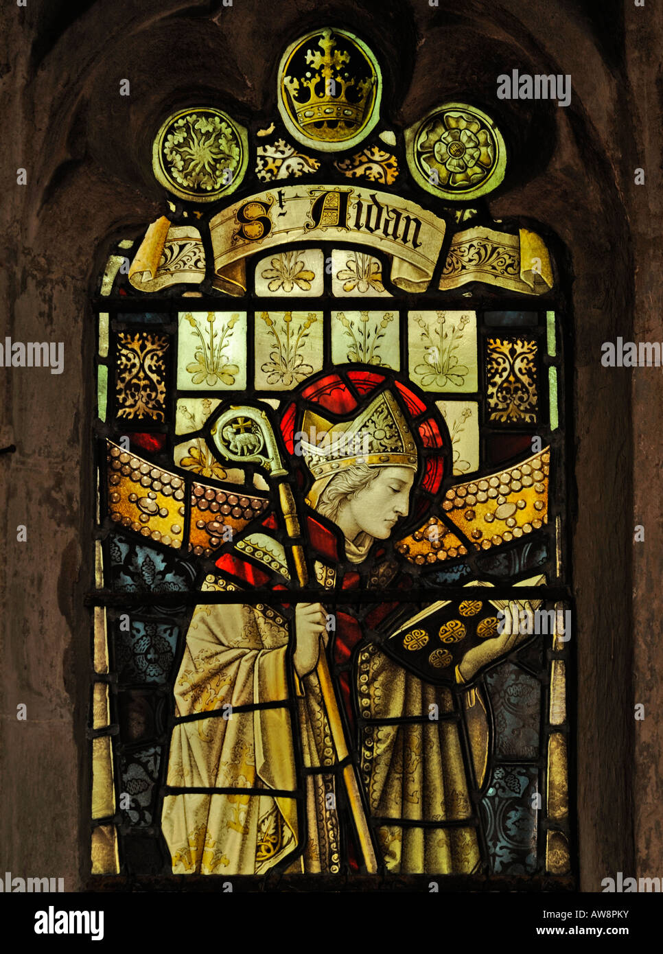 Saint Aidan (detail), Sanctuary North window. Church of Saint Cuthbert, Aldingham, Cumbria, England, United Kingdom, Europe. Stock Photo