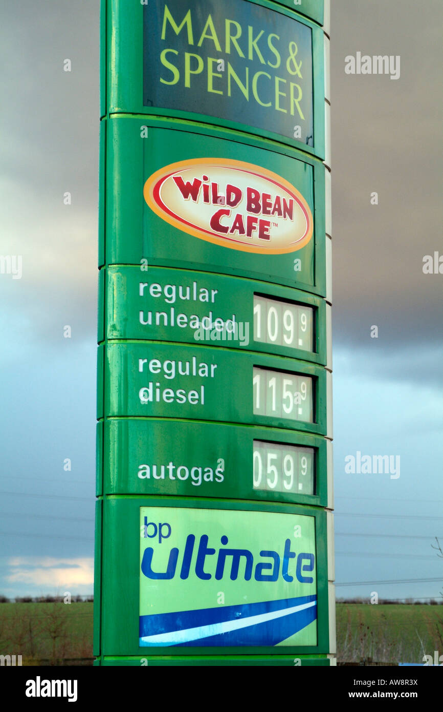 Fuel Prices Sign at BP Petrol Station with cafe and Marks Spencer Shop Stock Photo