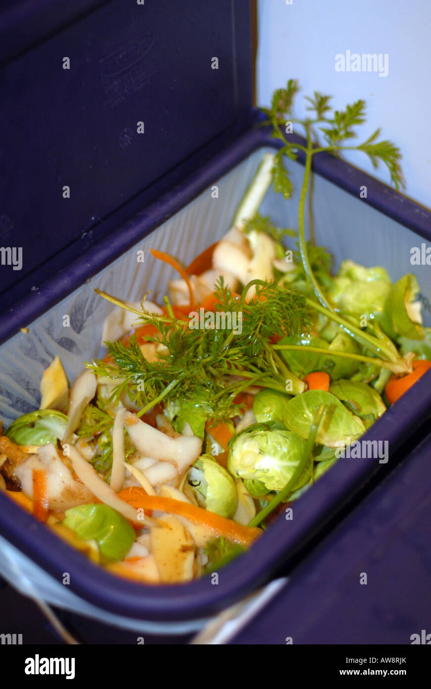 Green waste Food peelings in a green bin Stock Photo Alamy