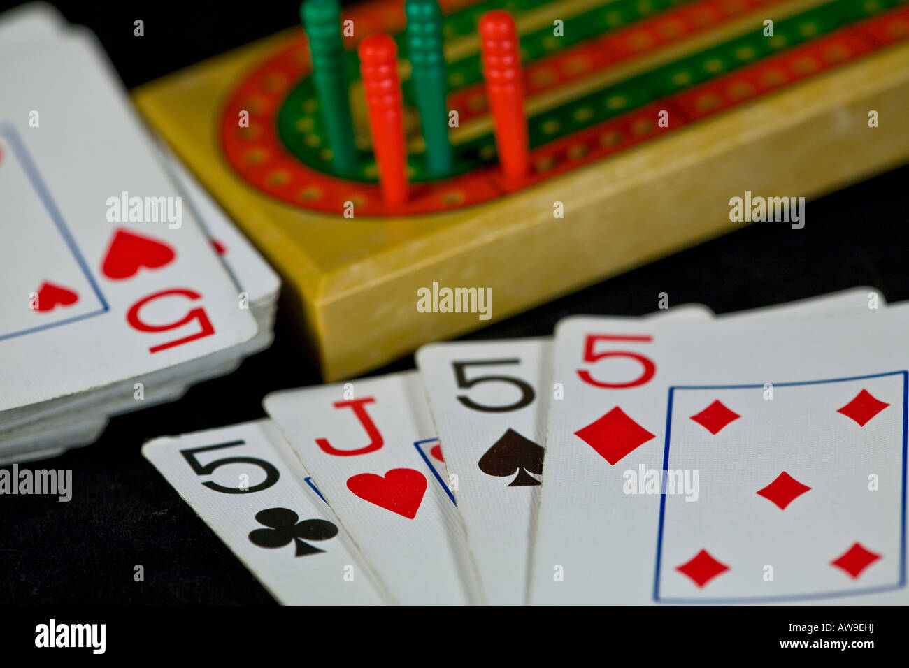 A Cribbage Board With Pegs And Playing Cards Stock Photo 16509677