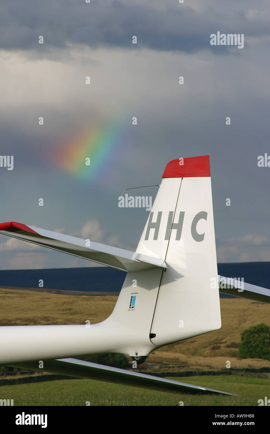 The tailplane of a modern training glider with partial rainbow in the background Stock Photo Alamy