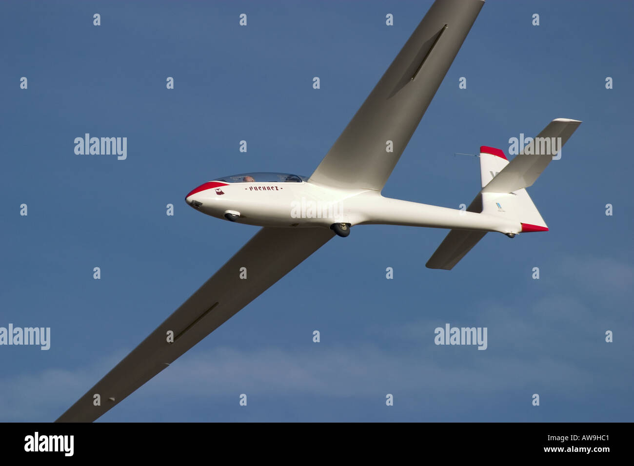 A modern Puchacz training glider turning before landing shot from