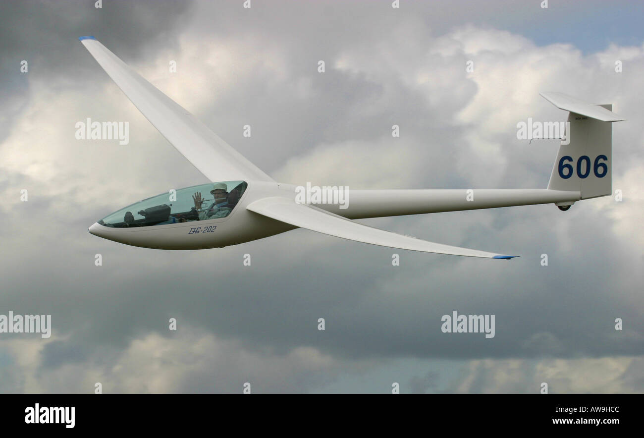A modern high performance glider. The pilot is waving. Stock Photo