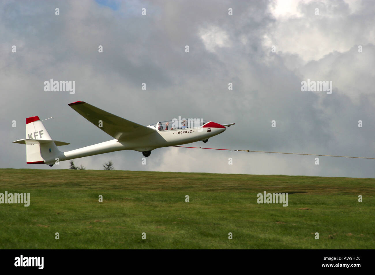A modern Puchacz training glider being lanched. The pilot in the back
