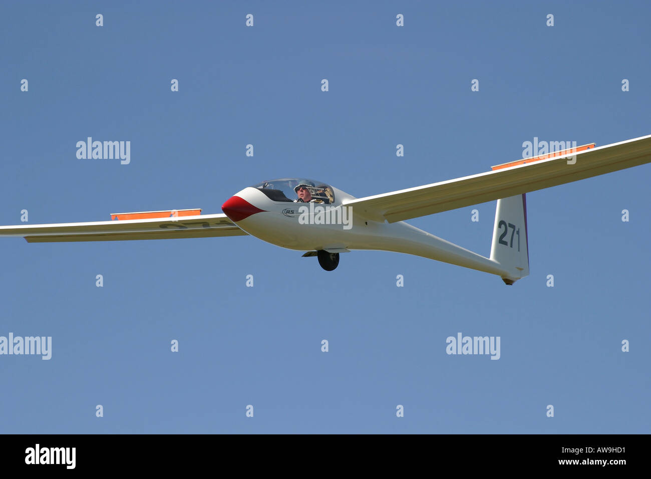 A modern single seat glider coming in to land with airbrakes open Stock Photo