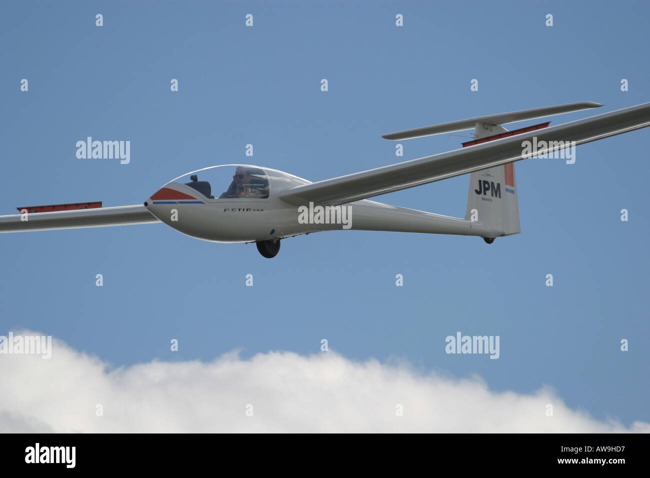 A modern single seat glider coming in to land with airbrakes open Stock  Photo - Alamy