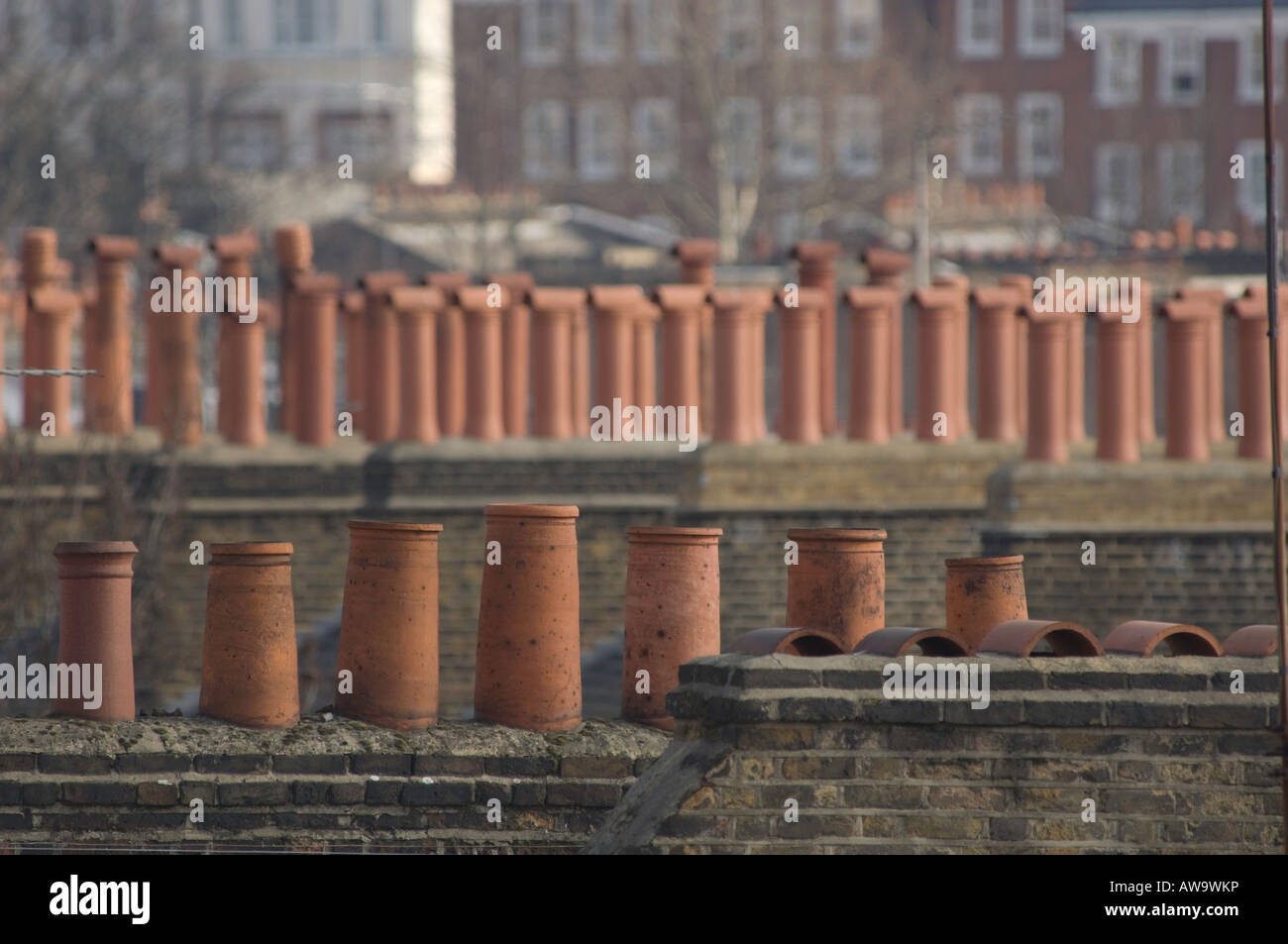 Chimney pots and television aerials evoke a past London skyline. Stock Photo