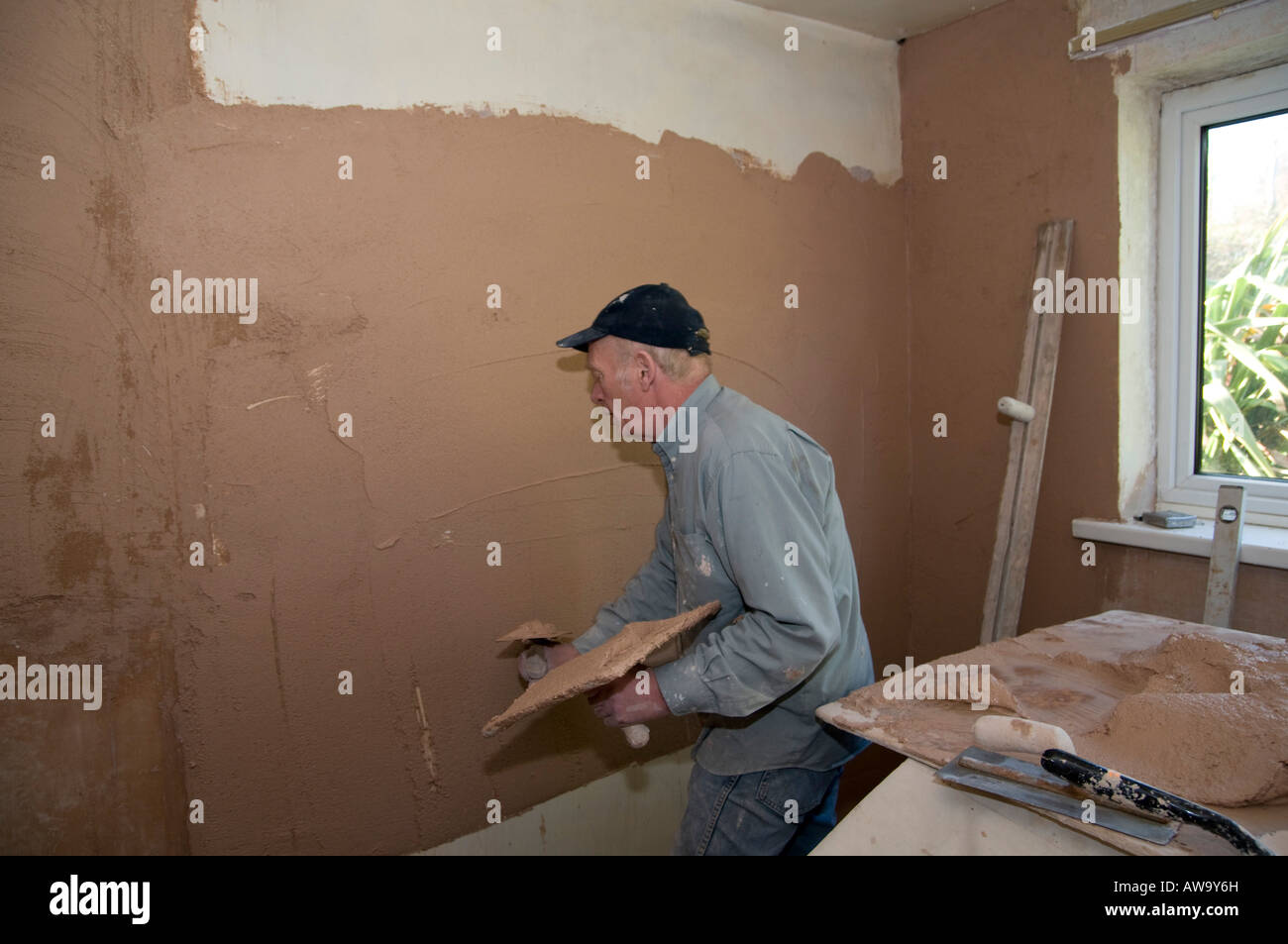 Plastering old wall Stock Photo - Alamy