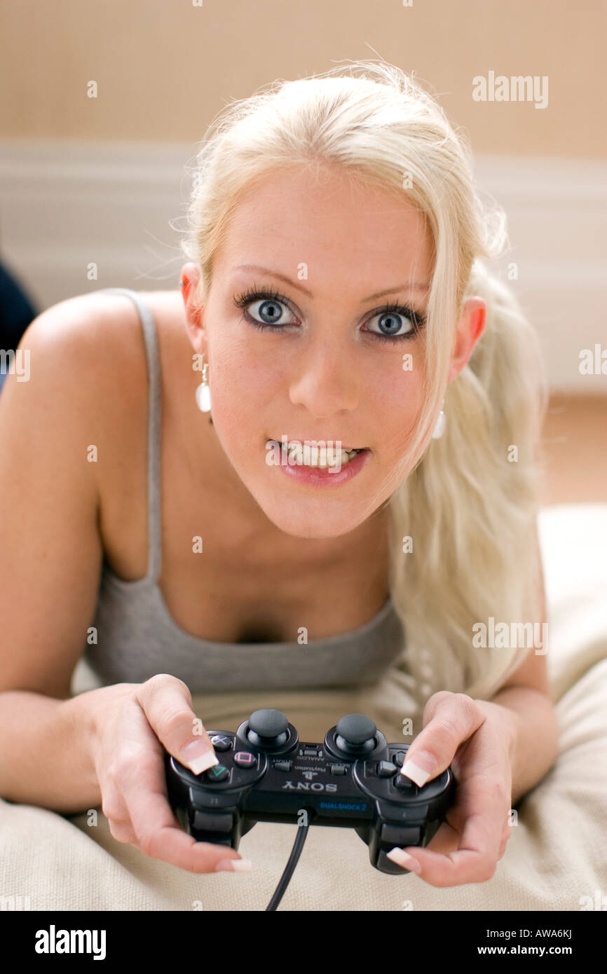 Girl playing on Playstation game Stock Photo