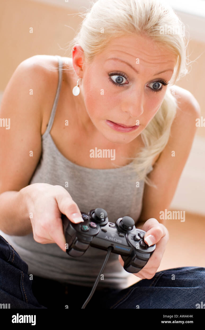 Girl playing on Playstation game Stock Photo