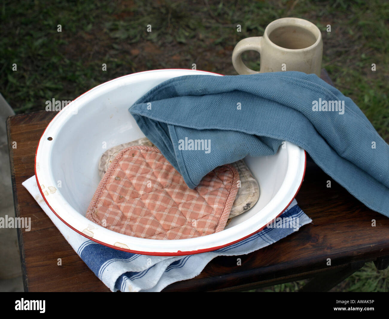 An outside water bowl and towels used at an old west reenactment that replicated the lack of indoor plumbing of the 1850s Stock Photo