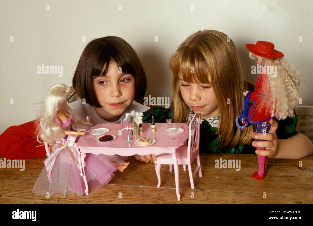 girls playing with Barbie dolls Stock Photo - Alamy
