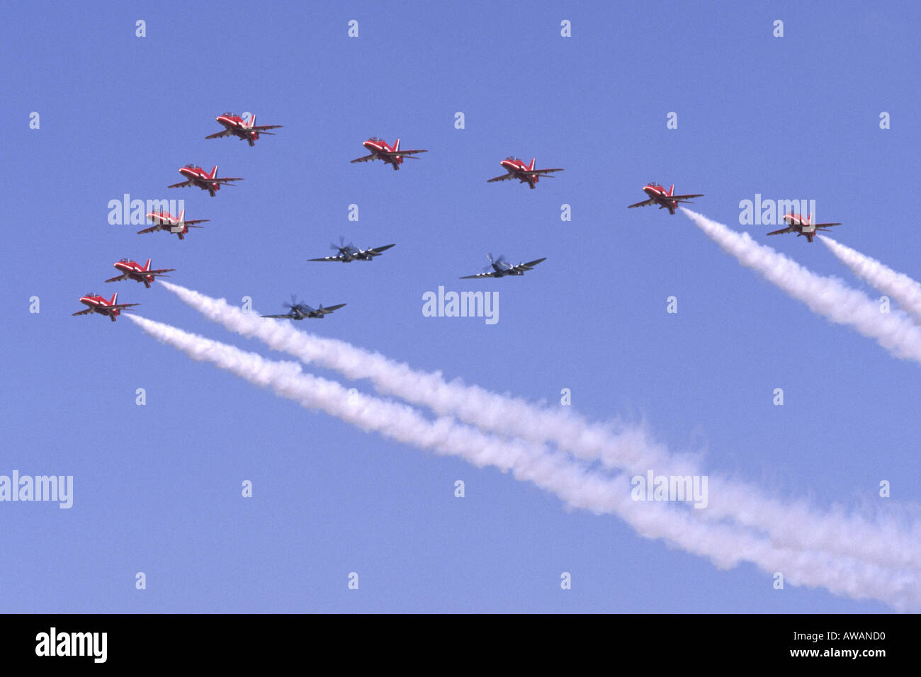 Red Arrows Hawk T1 & Supermarine Spitfire Formation Stock Photo