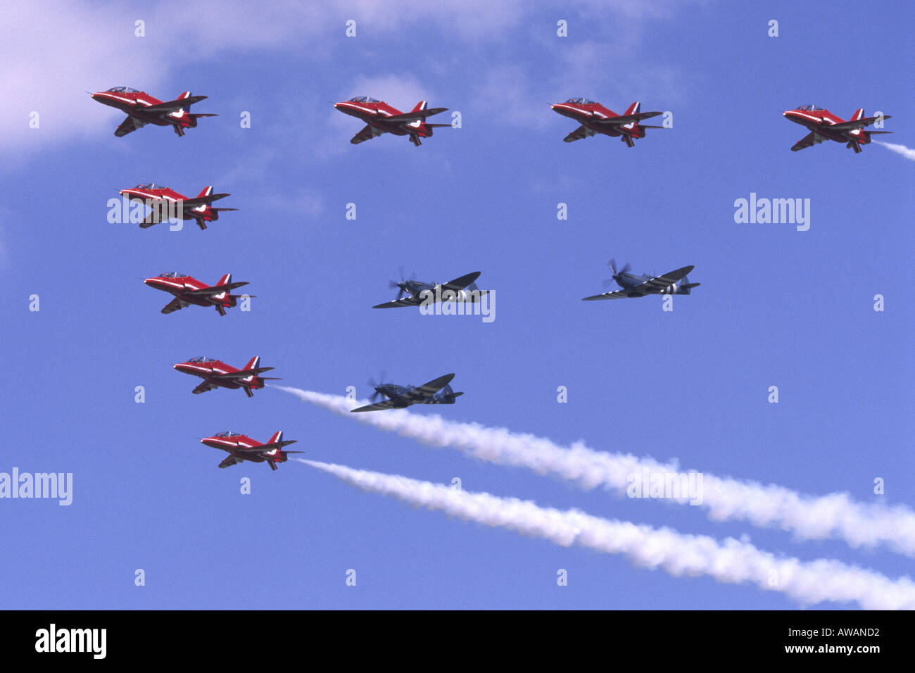 Red Arrows Hawk T1 & Supermarine Spitfire Formation Stock Photo
