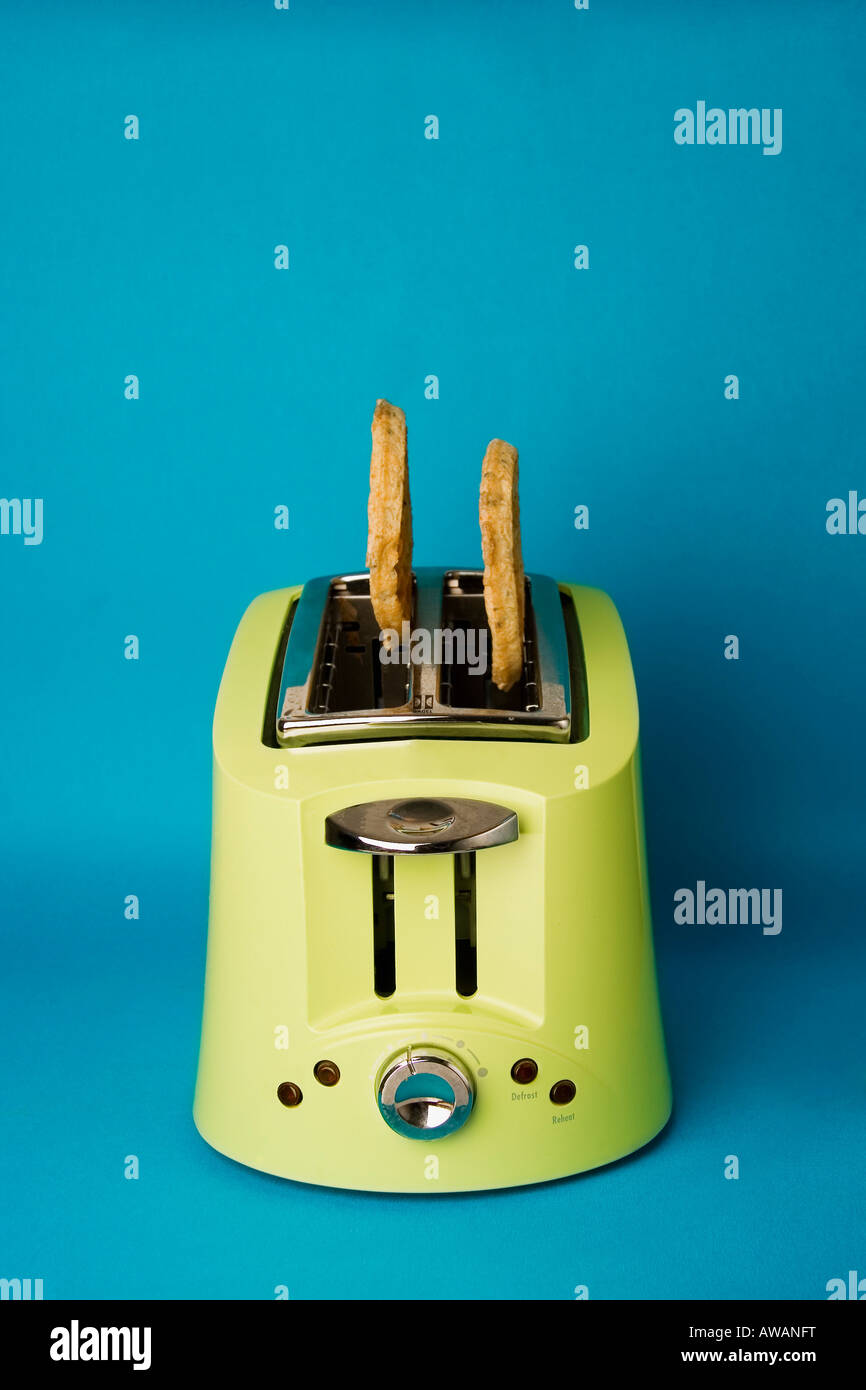 Bread in a toaster Stock Photo Alamy