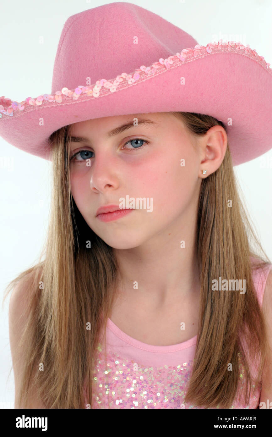 Girl wearing a pink cowboy hat Stock Photo Alamy