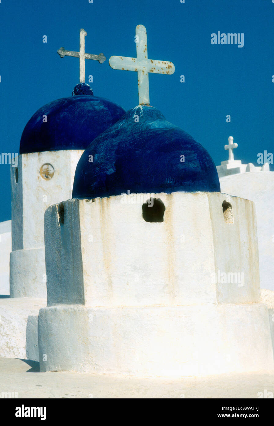 Close up of blue domed white washed church roofs with crosses, Santorini, Greek Islands Stock