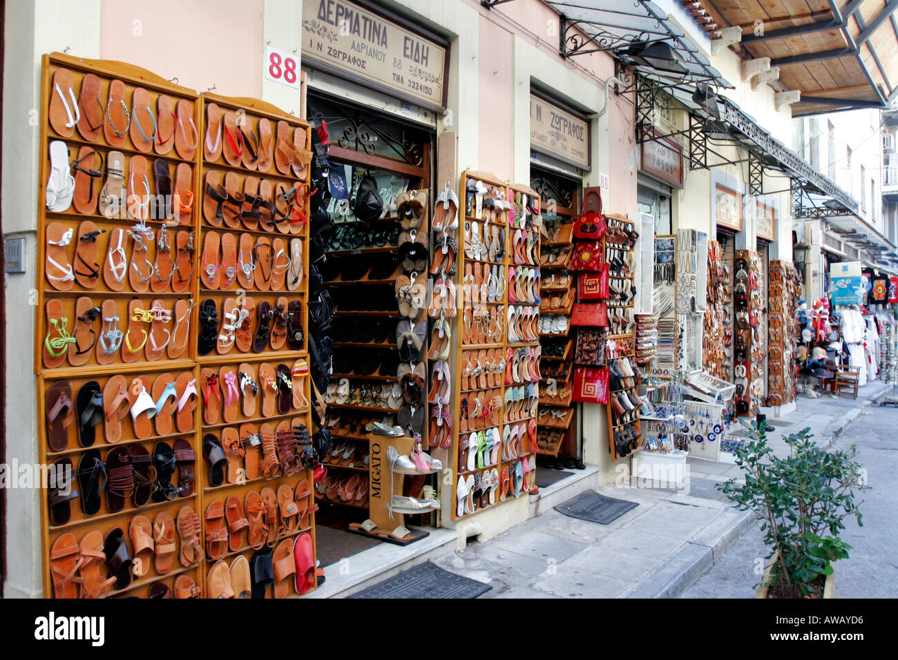 greece attica athens a plaka street with shoe shop Stock Photo - Alamy