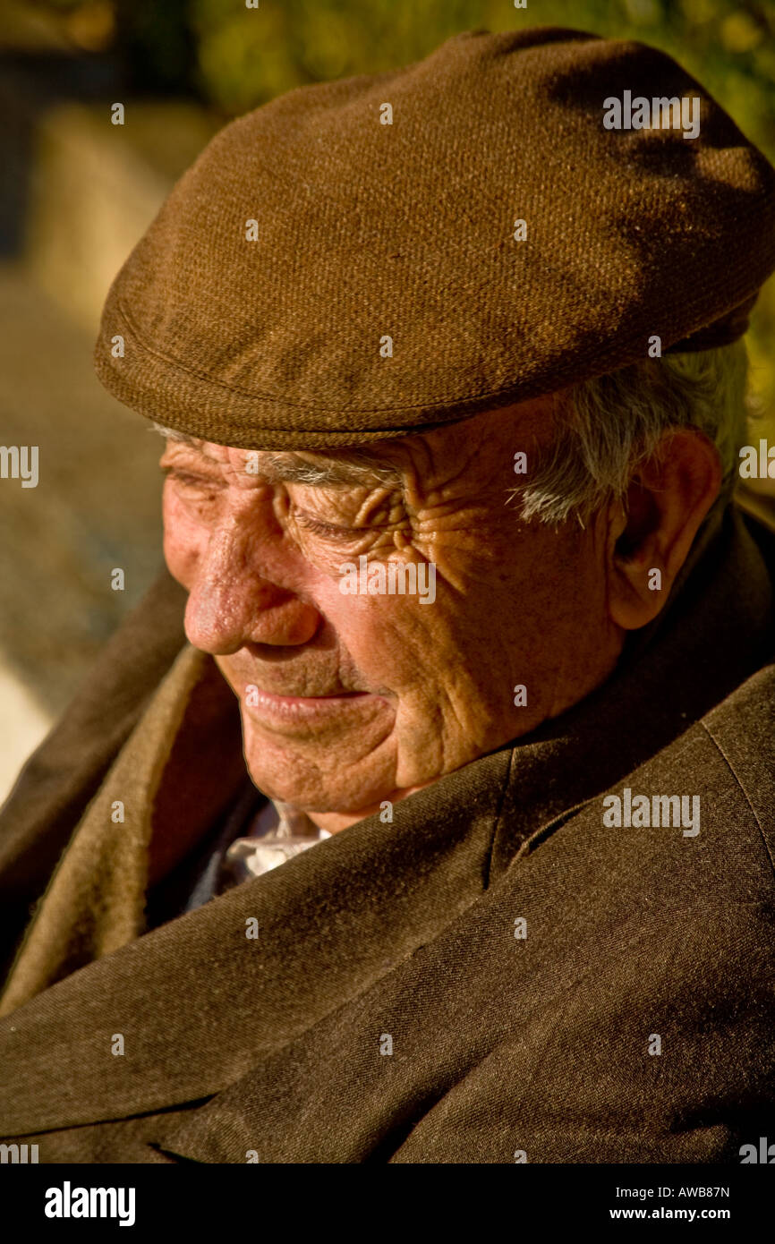 An old man in a Ronda Spain public park Stock Photo
