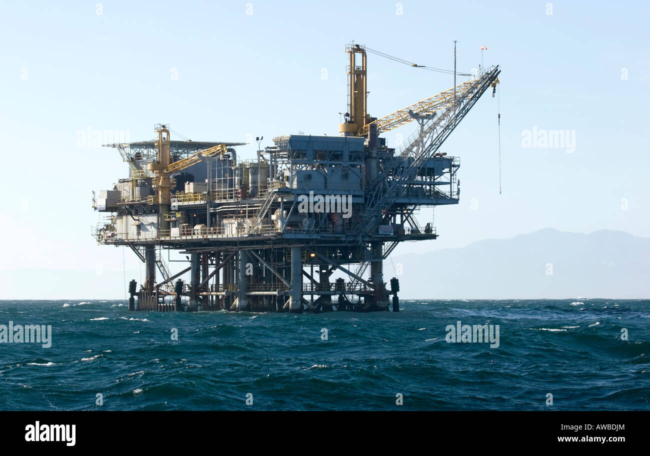 Oil drilling platform anchored to the ocean floor 300 feet below Stock Photo