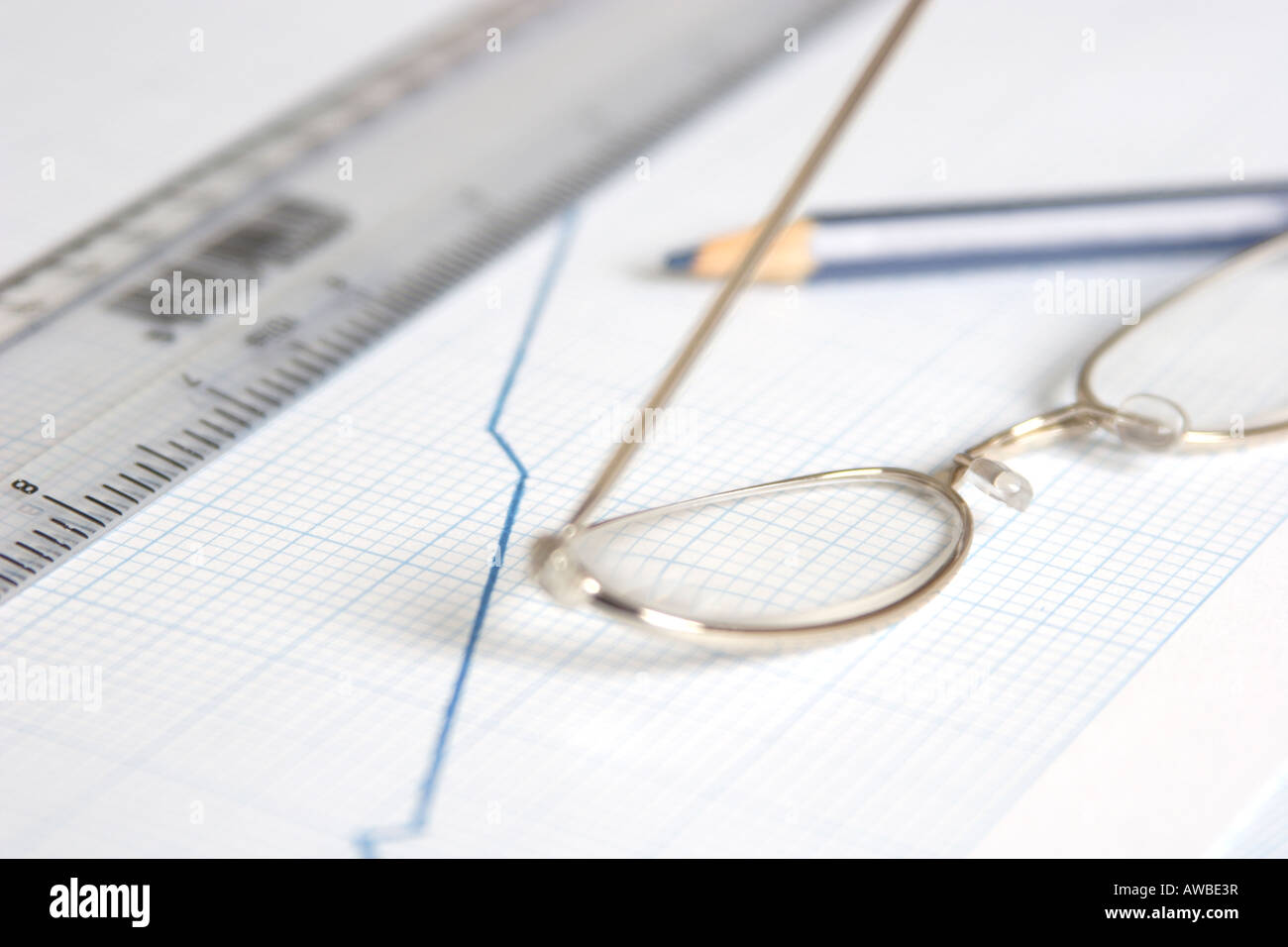 graph or chart glasses ruler and pencil Stock Photo - Alamy