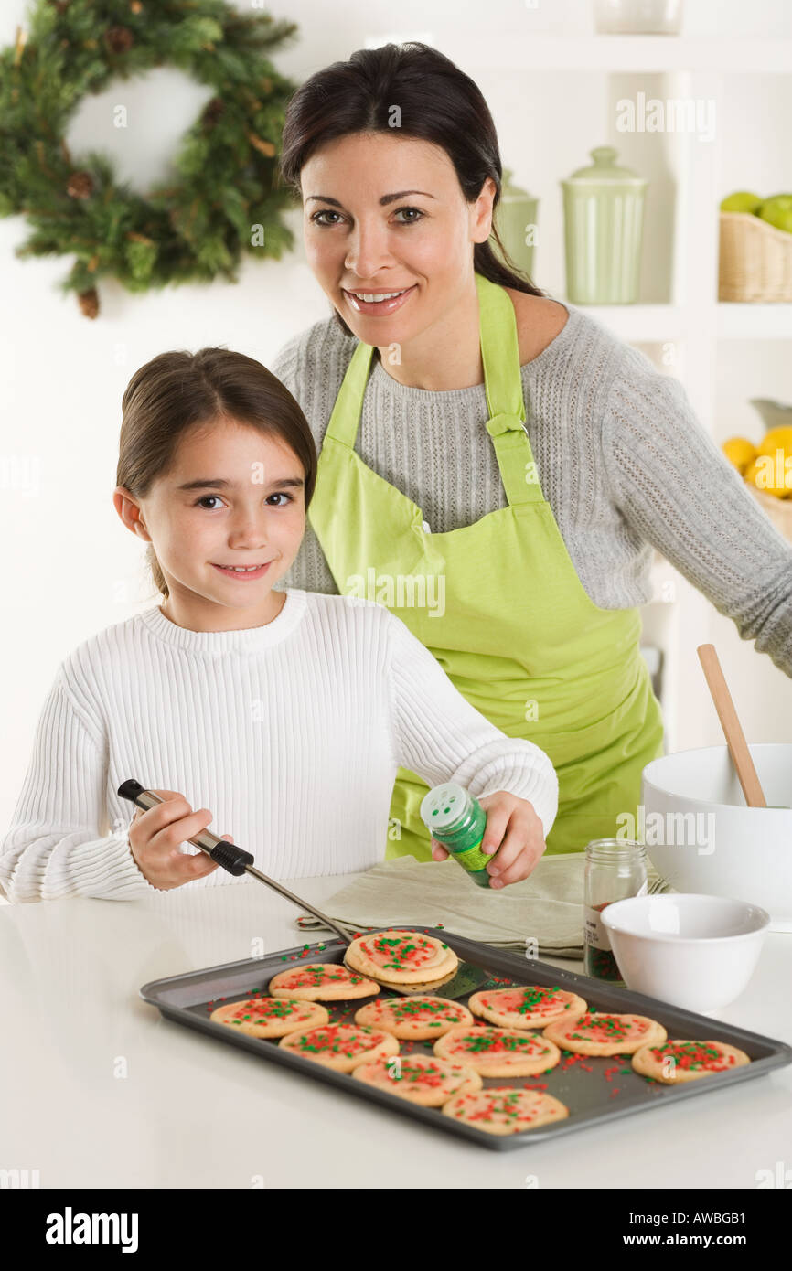 Mother and daughter baking Christmas cookies Stock Photo