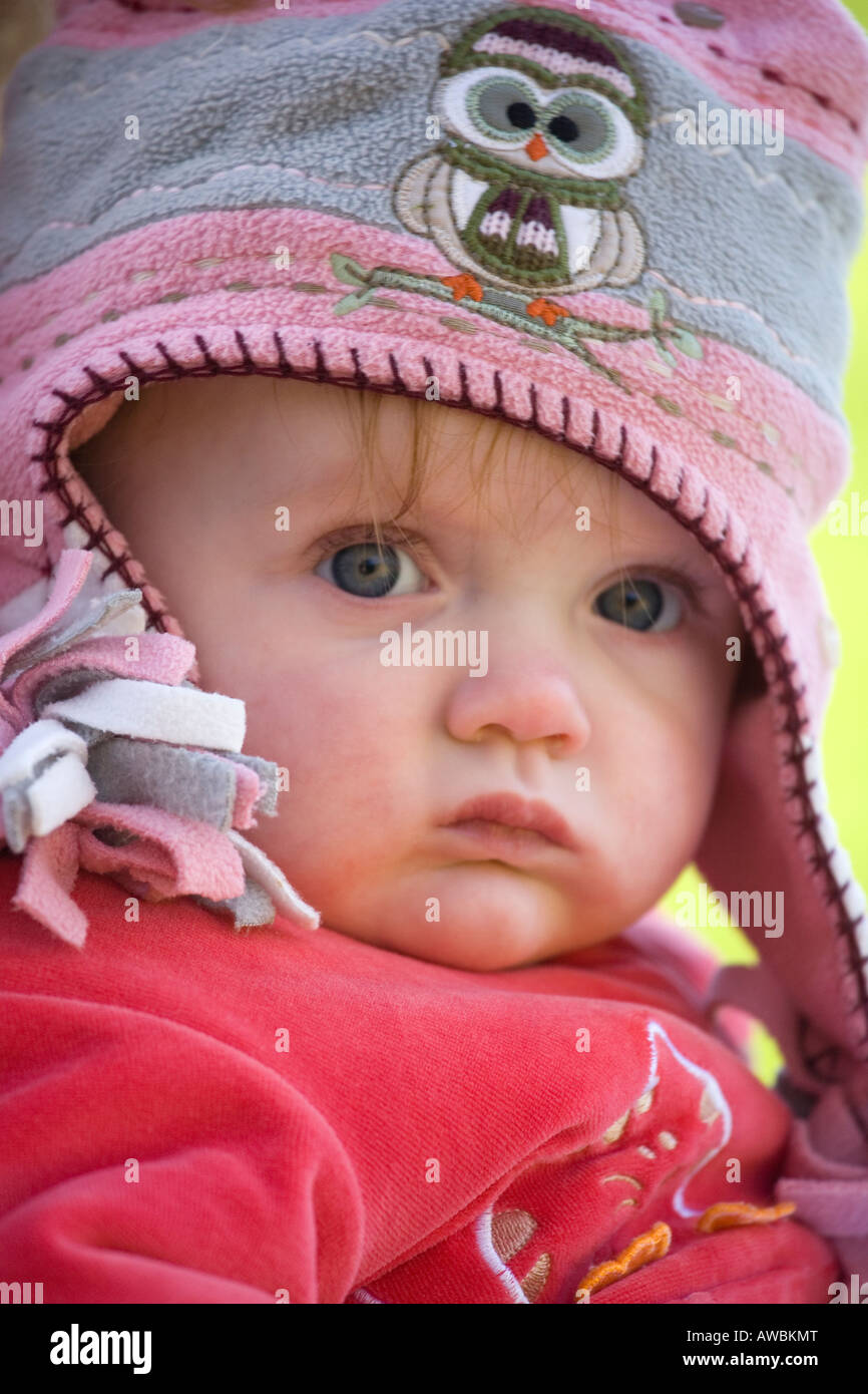 8 month old baby girl wrapped up for winter Stock Photo