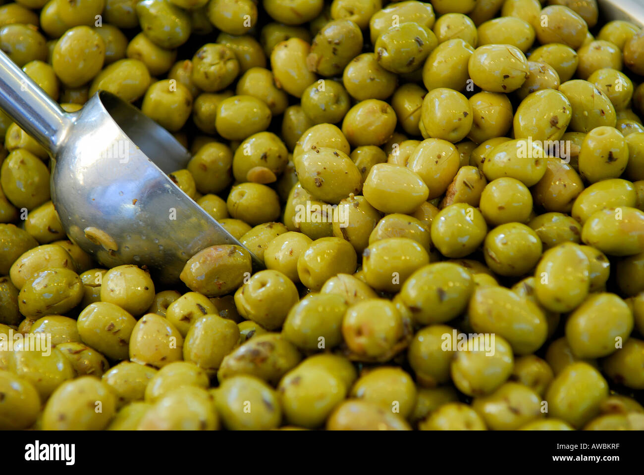 green olives on market stall Stock Photo