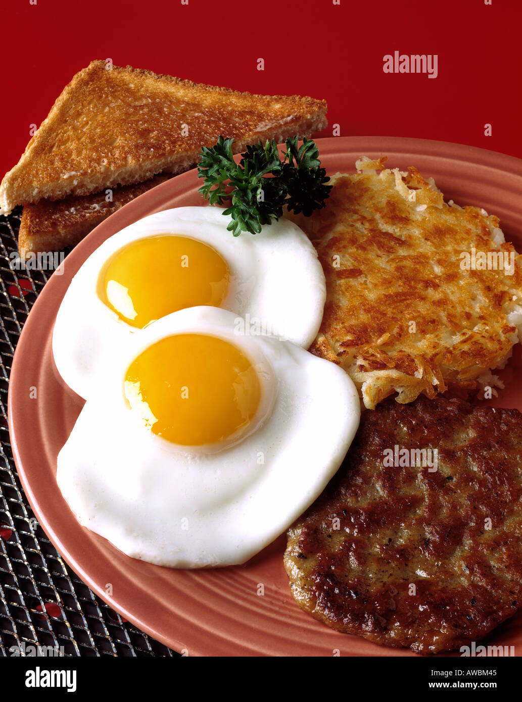 hearty breakfast two fried eggs sunny side up hash brown potato