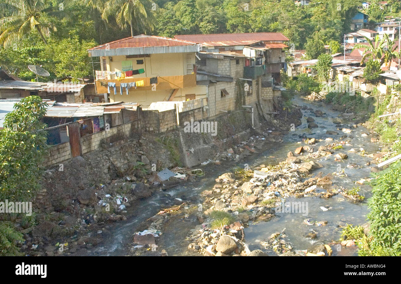 Overview of a slum and its creek overflowing with rubbishes, in Jayapura, West Papua, Indonesia Stock Photo