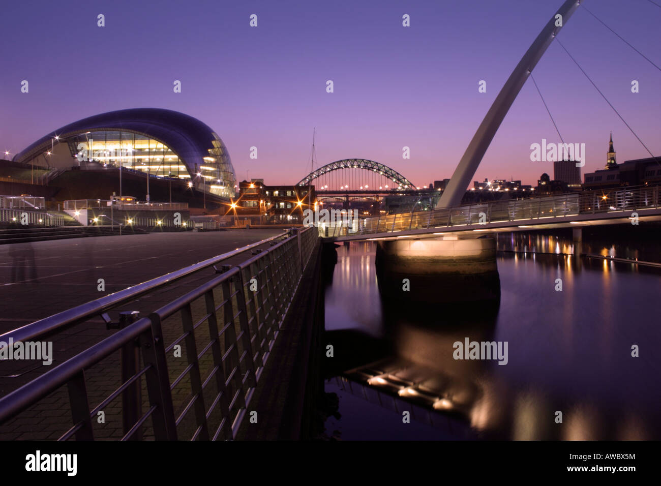 Newcastle Gateshead Quayside showing Millennium Bridge, Gateshead Sage and Tyne Bridge at Dusk, taken from Baltic Art Gallery Stock Photo