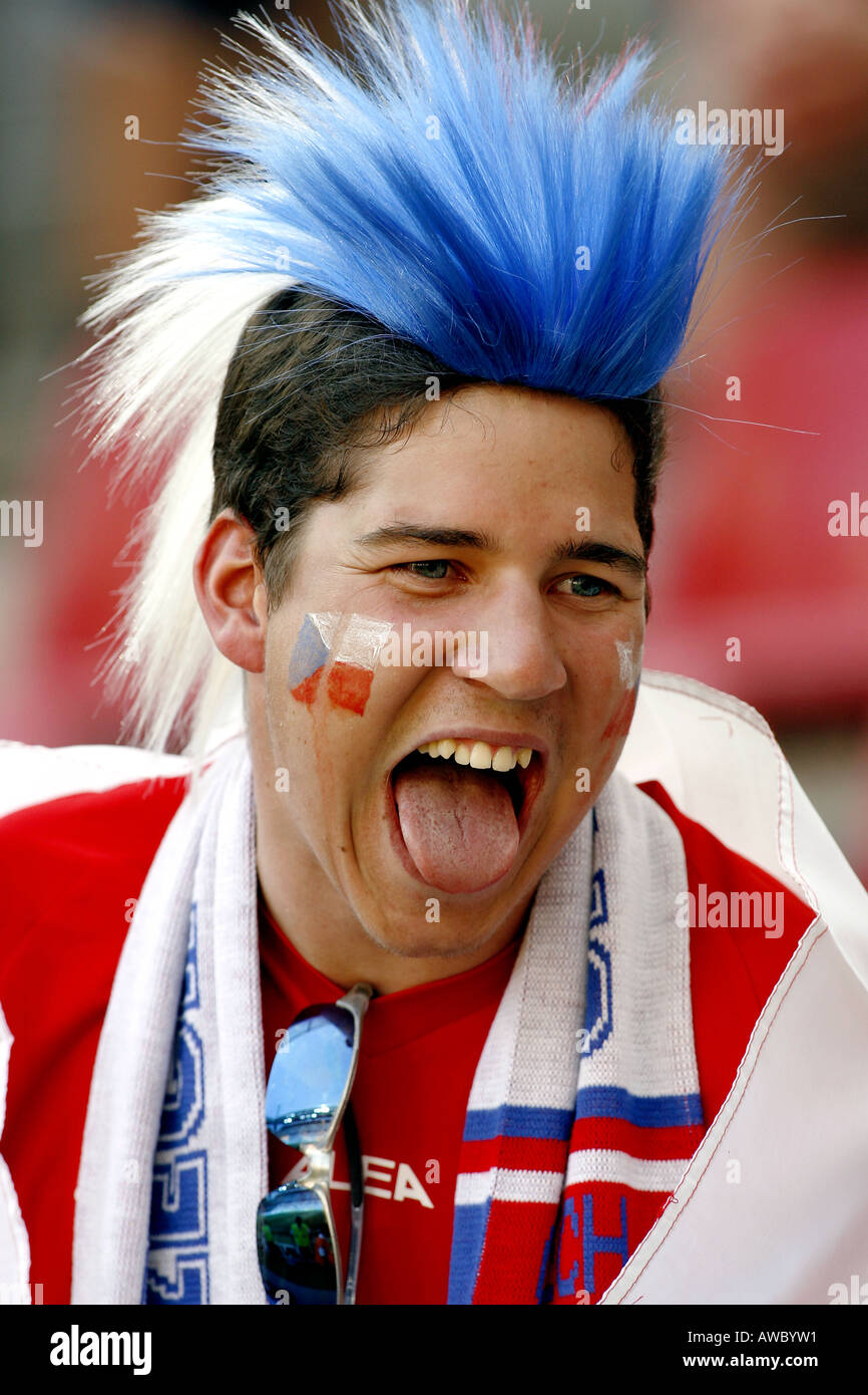 2006. A male Czech Republic fan wearing a wig in the crowd during the 2006 World Cup Stock Photo