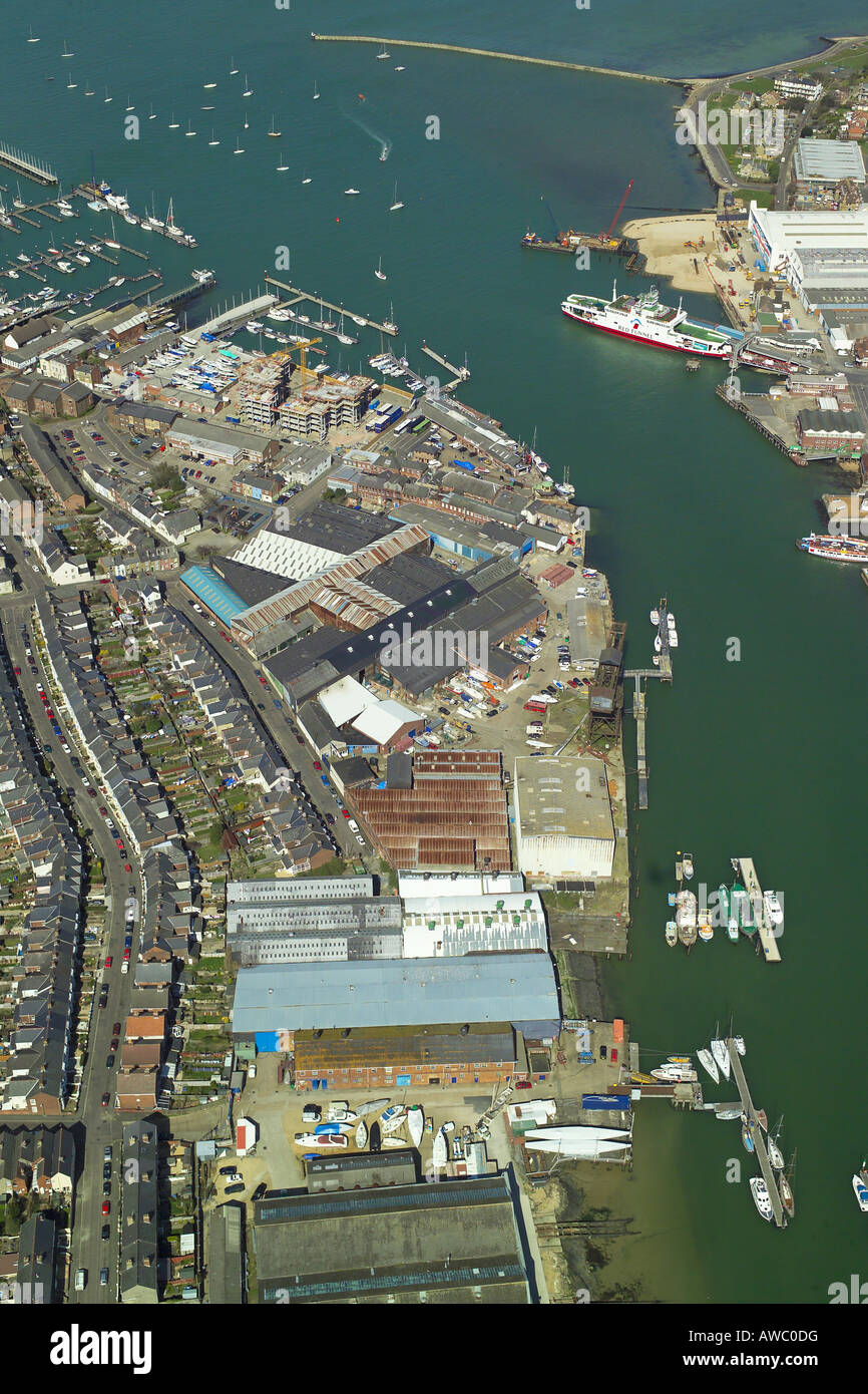 Aerial view of Cowes on the Isle of Wight featuring the boat yards, marinas and developments along the River Medina Stock Photo
