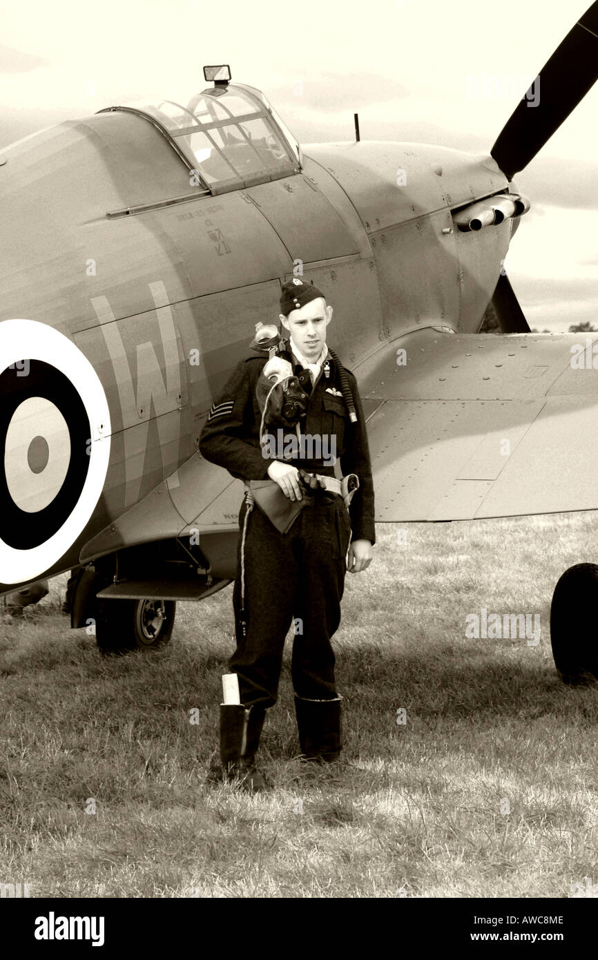 WWII RAF Pilot stands by his Hurricane fighter plane for a photo Stock Photo