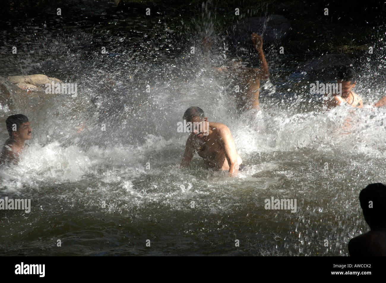 BATHING IN RIVER KERALA Stock Photo