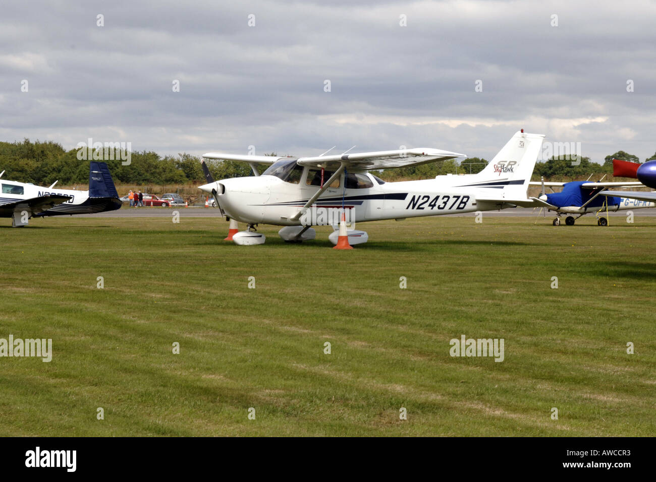 Cessna Light aircraft parked at an airfield before a storm arrives ...