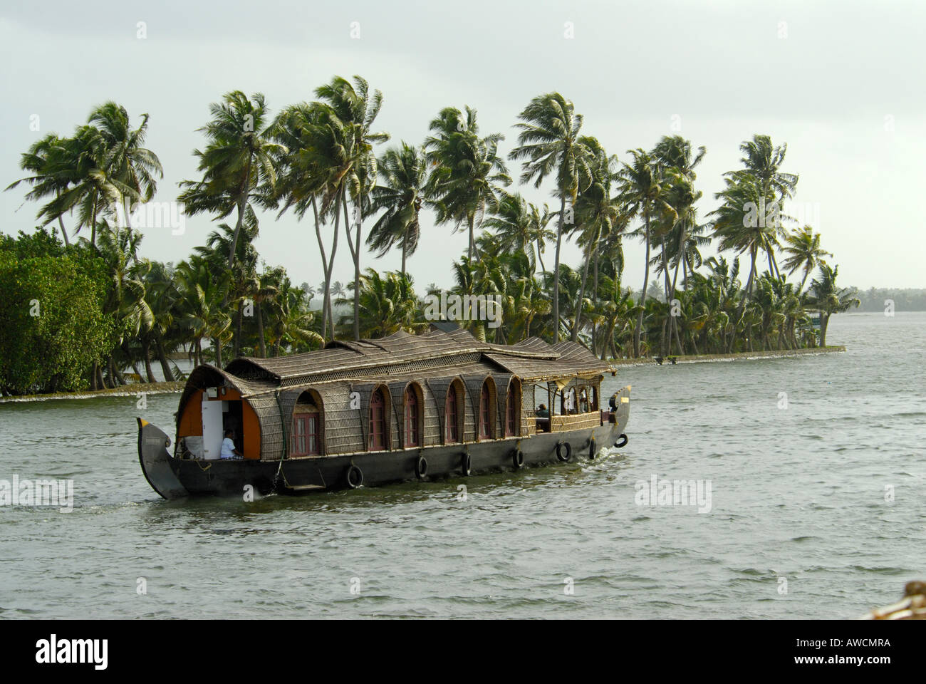 A HOUSE BOAT IN THE BACKWATERS OF ALLEPPEY Stock Photo