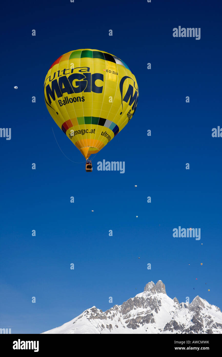 Hot air balloon ascending into a blue sky, Filzmoos, Salzburg, Austria, Europe Stock Photo