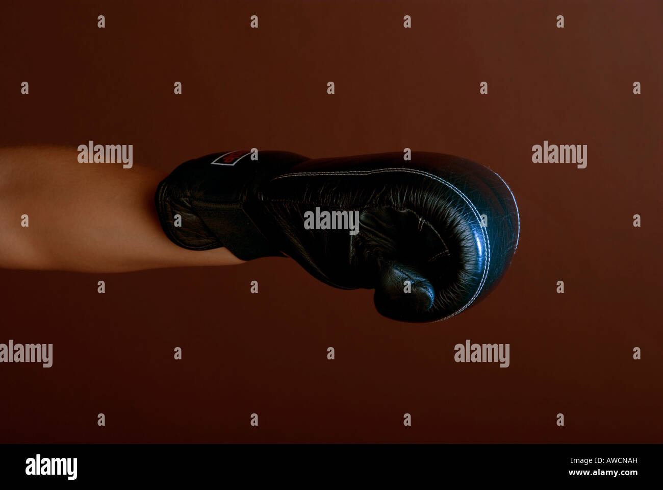 Extended arm, boxing gloves Stock Photo Alamy