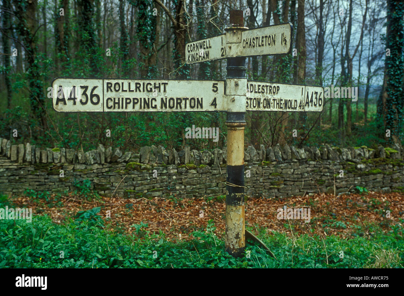 Old signpost on the A436 Oxfordshire England Stock Photo