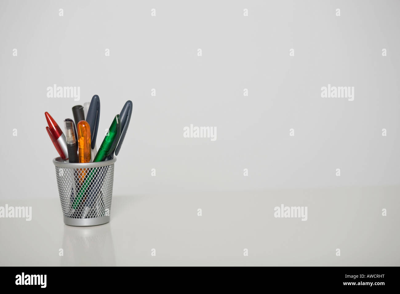 Pens in a pencil holder Stock Photo