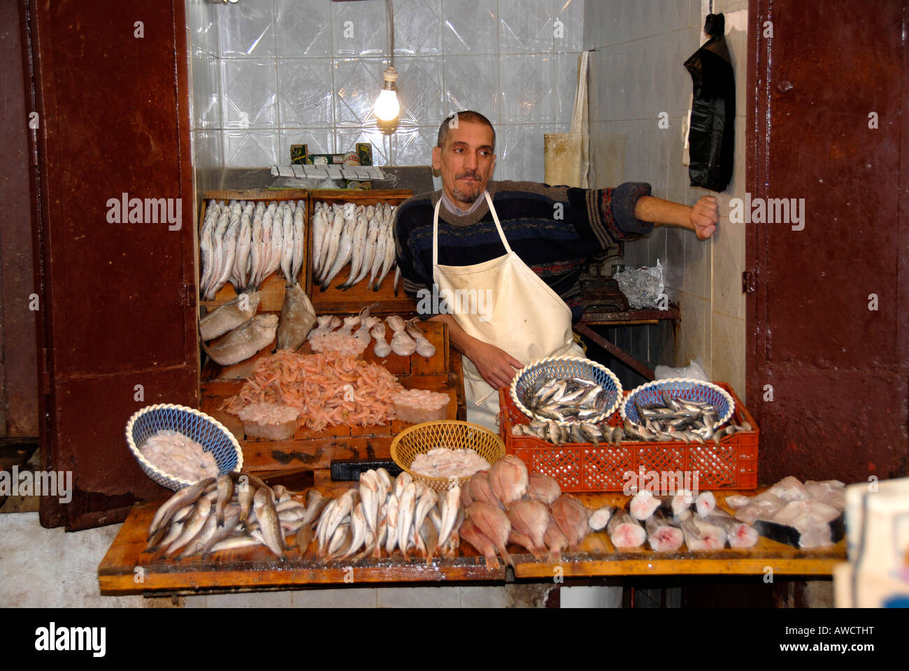 Fish vendor medina Fes El Bali Morocco Stock Photo