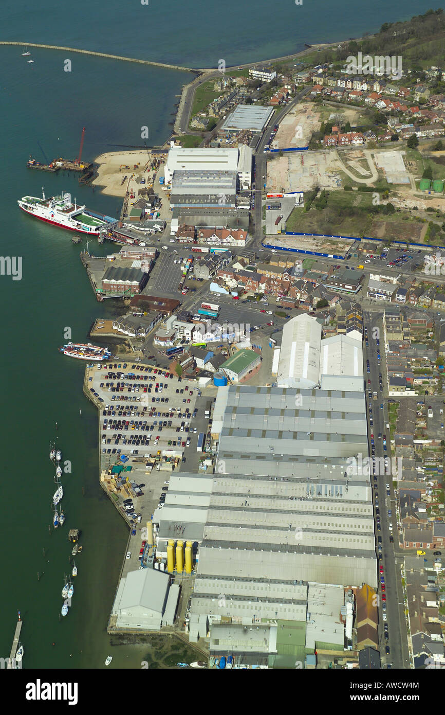 Aerial view of East Cowes on the Isle of Wight featuring the ferry terminal, boat yards & the Floating Bridge Stock Photo