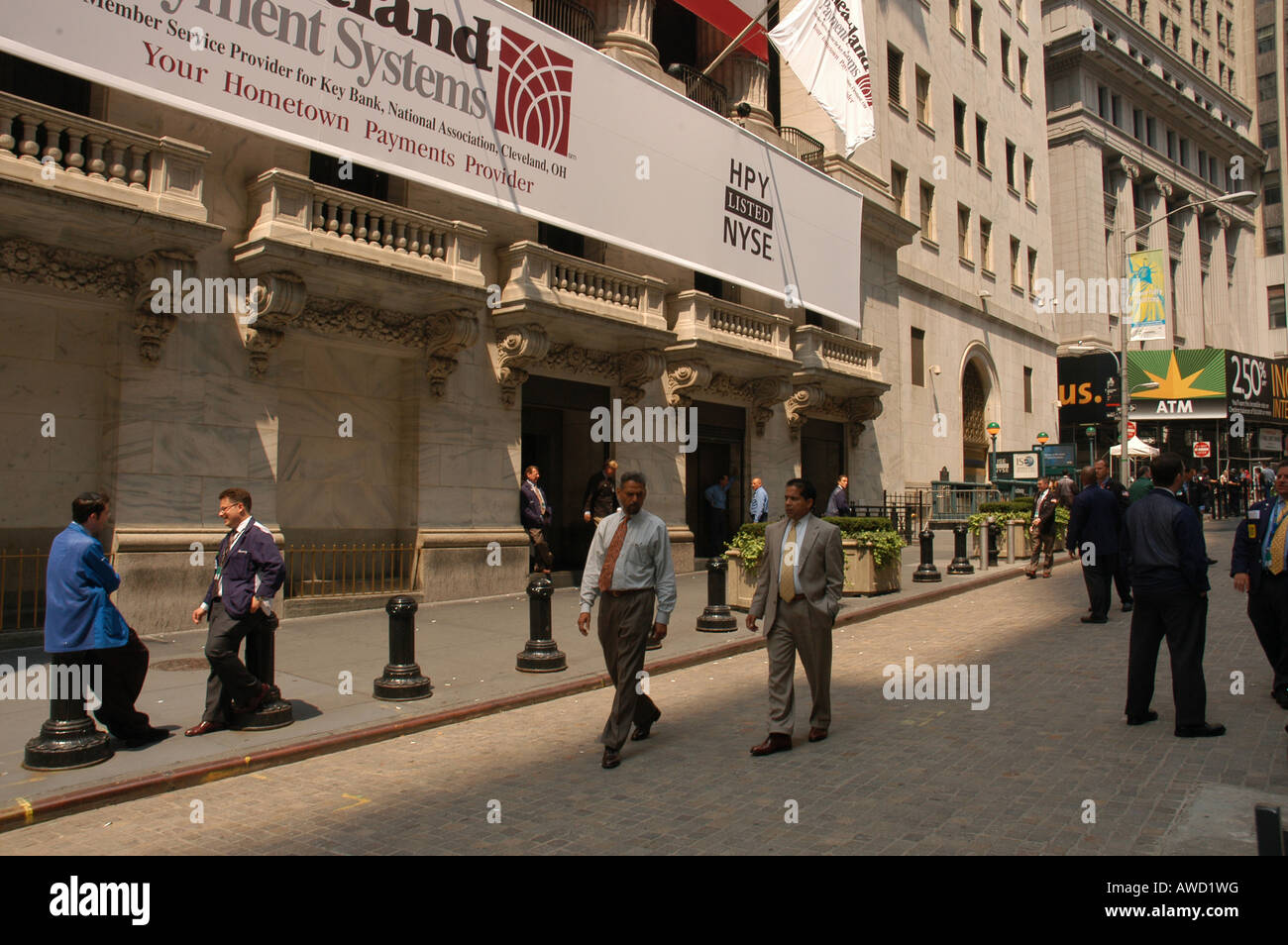 Businessmen in front of Wall Street New York USA Stock Photo Alamy