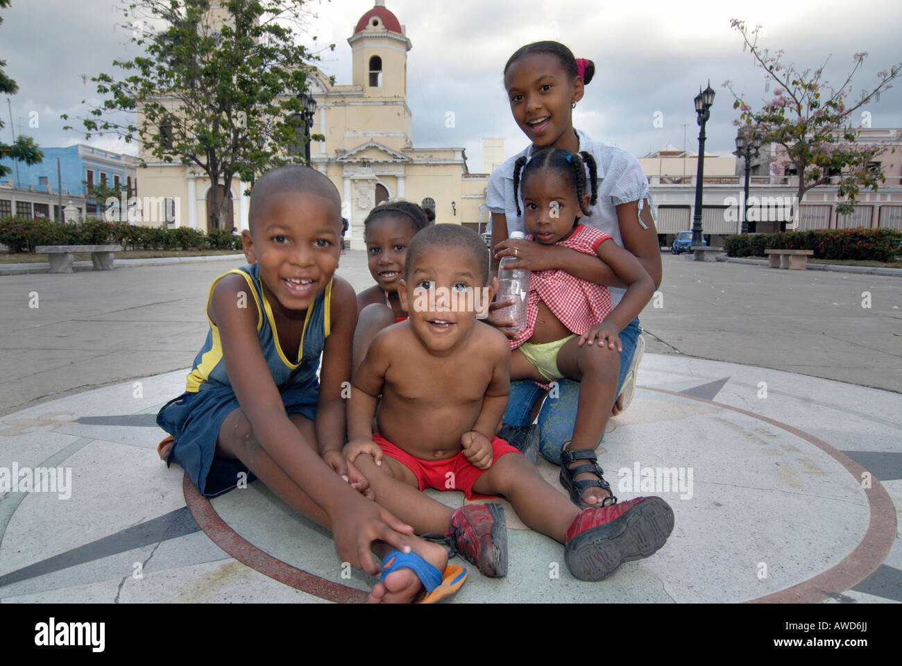 Children playing at Plaza José Martí, Cienfuegos, Cuba, Caribbean, Americas Stock Photo